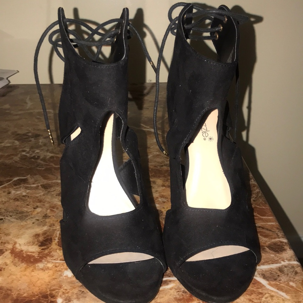 Black, open toed 4” heels.